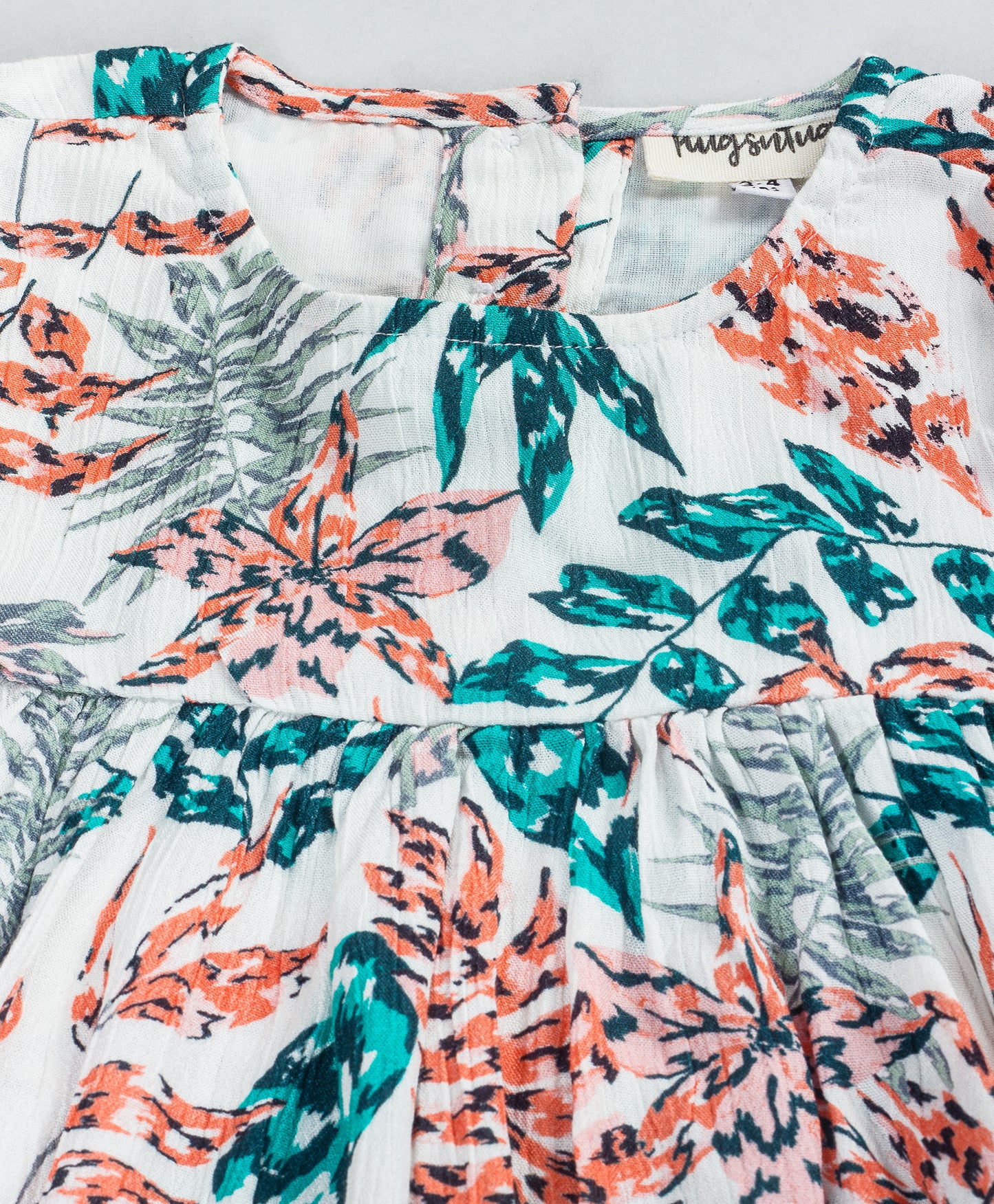 PEACH AND TEAL LEAF PRINT DRESS