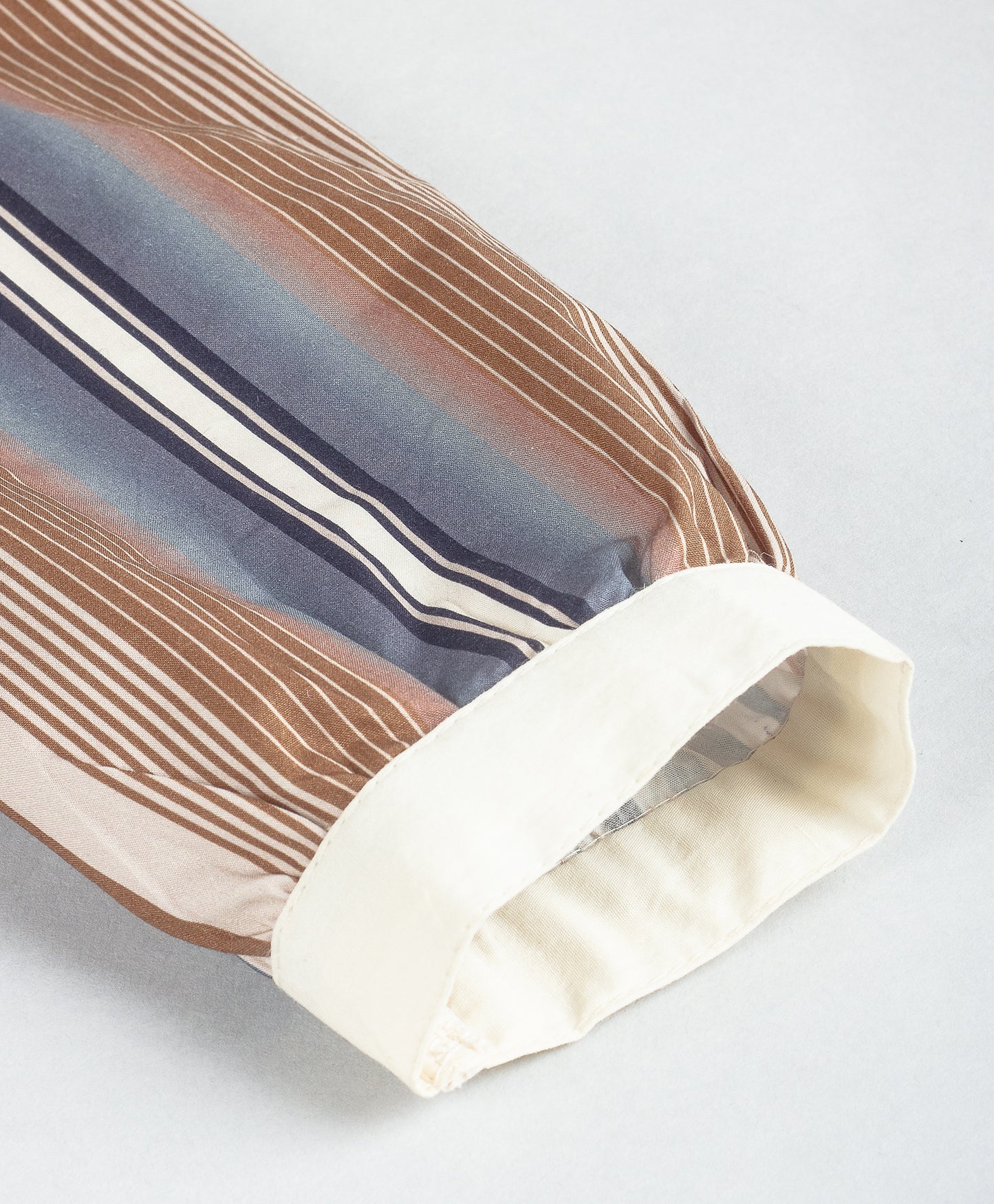 BROWN MULTI STRIPE SHIRT WITH STAR APPLIQUÉ AT CENTRE