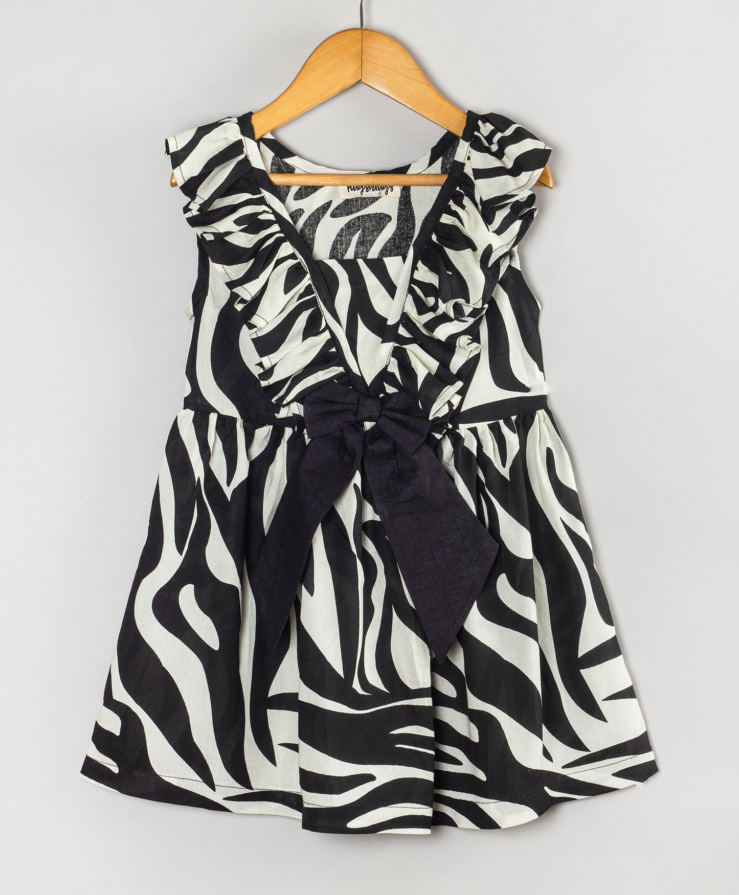ZEBRA PRINT DRESS WITH BLACK BOW