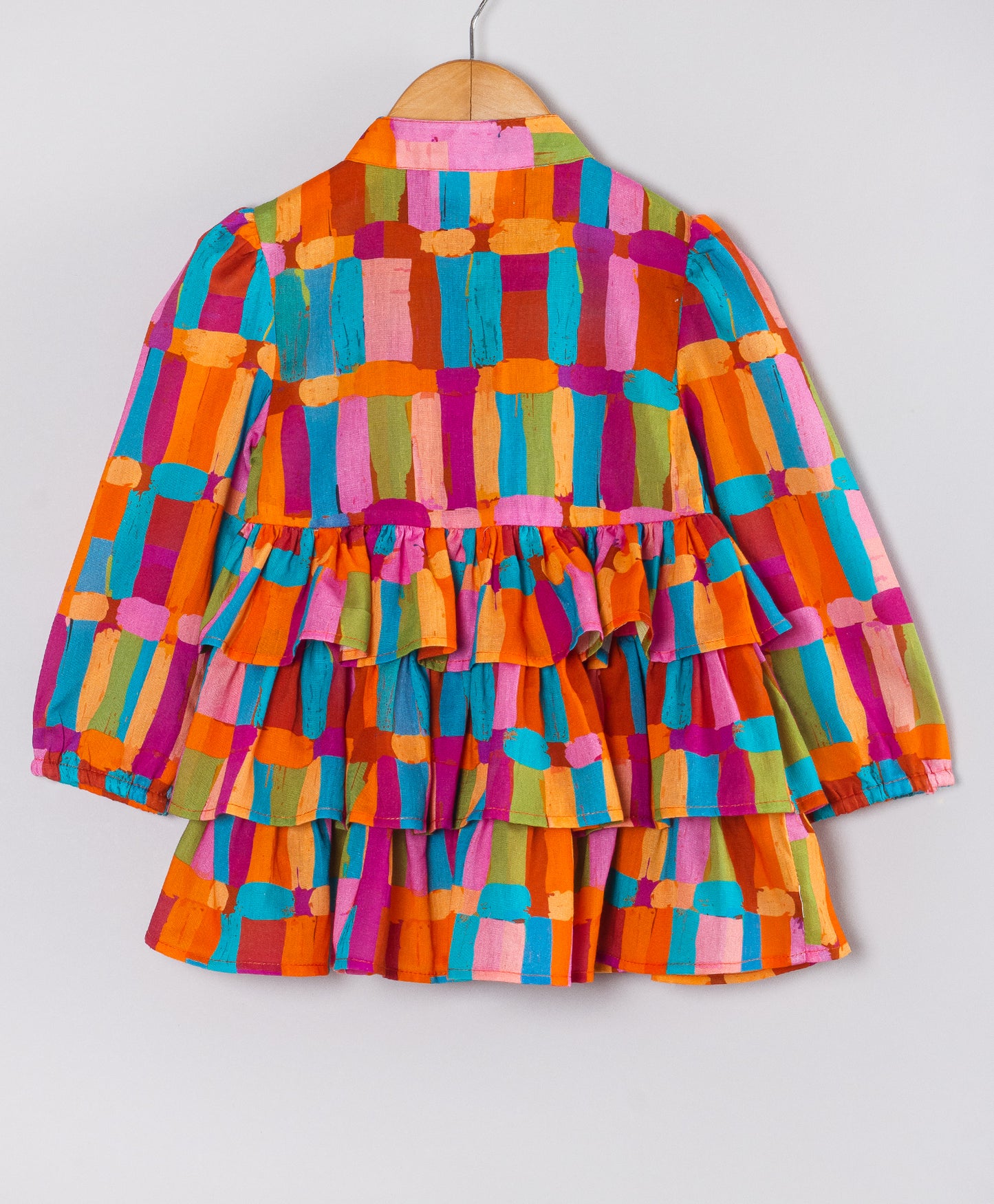 ABSTRACT PRINT TOP WITH FRILLS AT FRONT