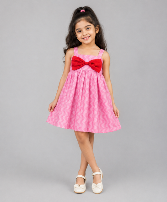 PINK SELF WAVE PRINT DRESS WITH RED BOW