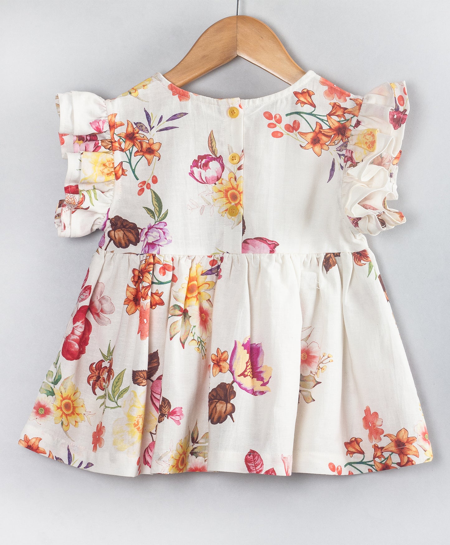 FLORAL PRINT TOP WITH YELLOW TIE UP AT NECK
