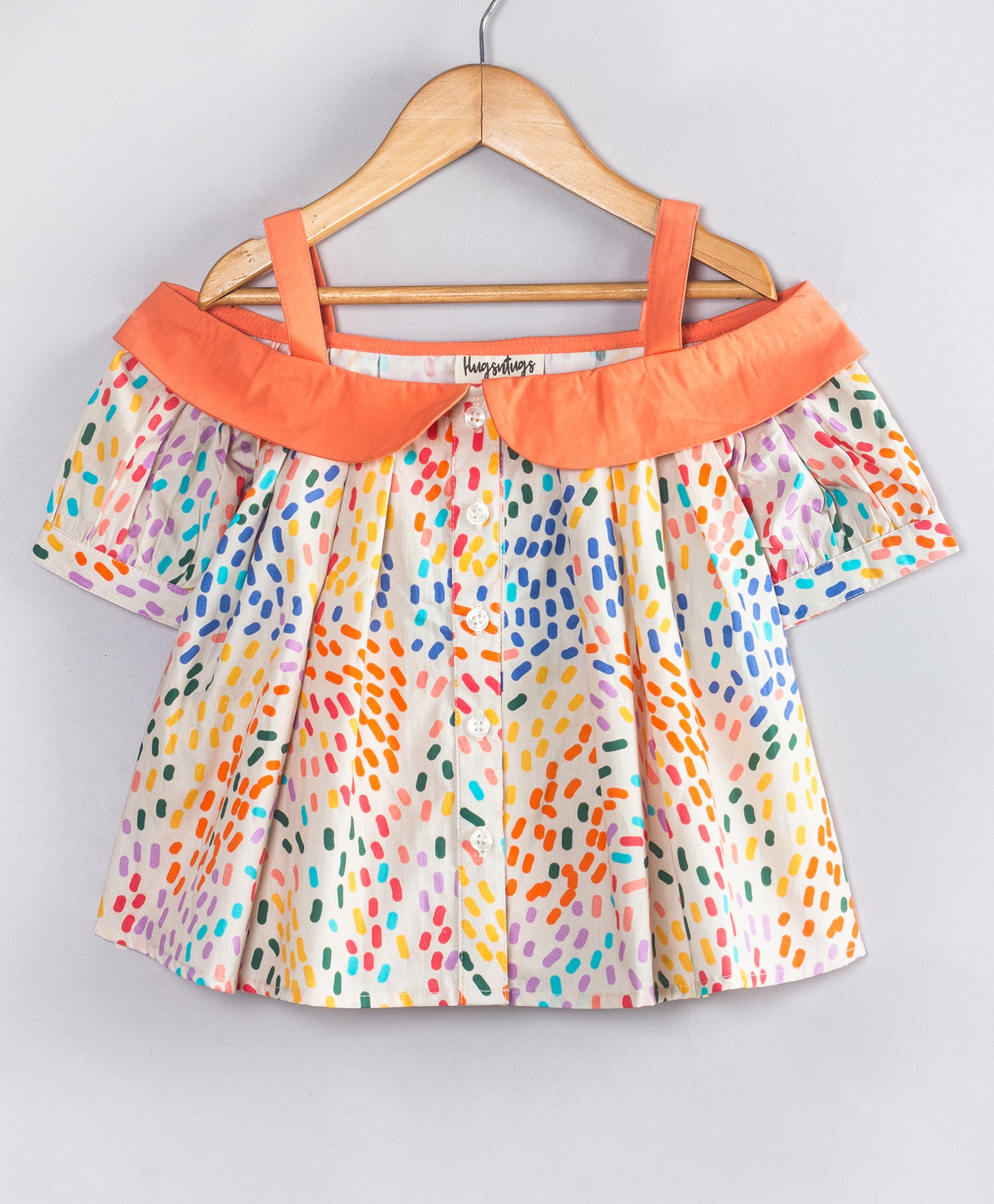 CONFETTI PRINT COLD SHOULDER TOP