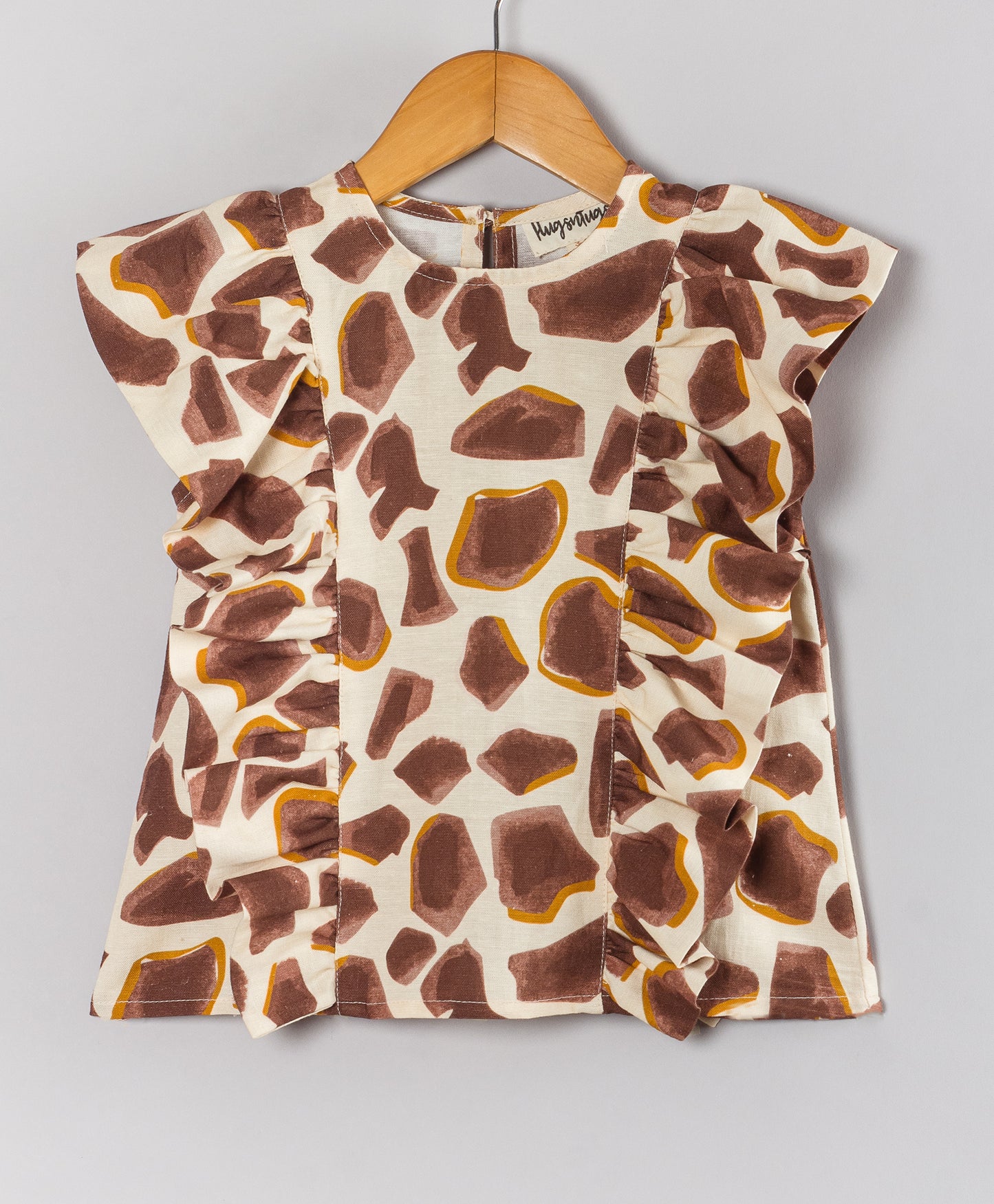 ABSTRACT PEBBLE PRINT TOP WITH SIDE FRILLS