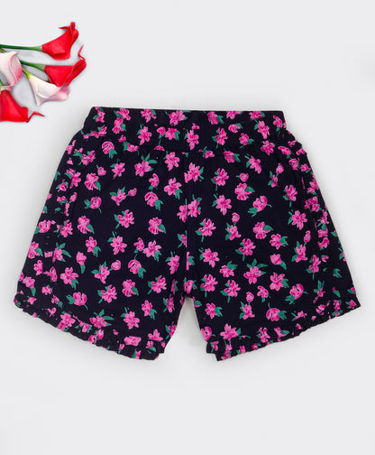 Black shorts with pink flower print all over