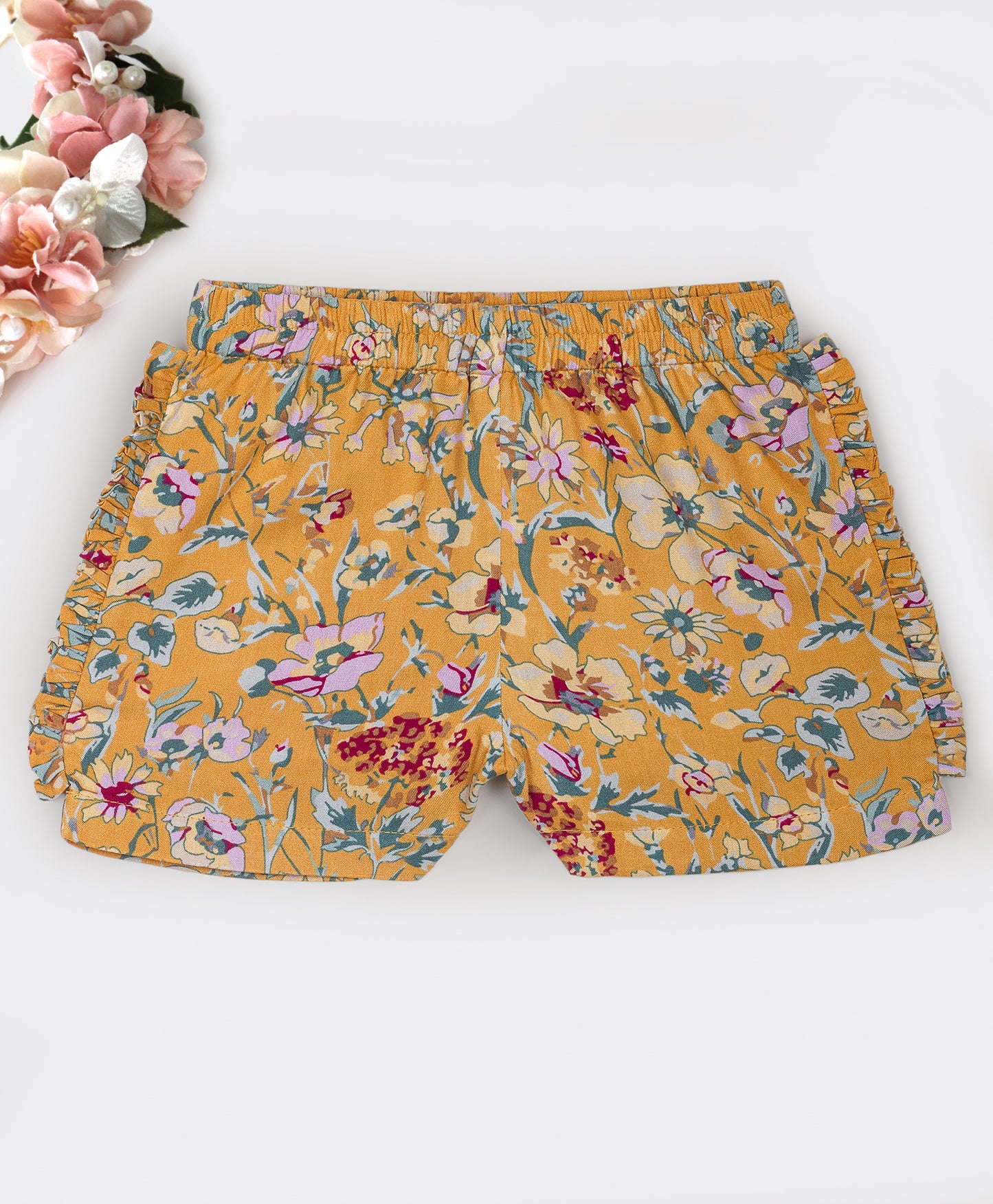Mustard floral print shorts with ruffles on the side