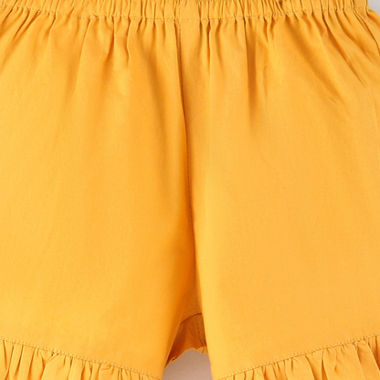 Mustard solid shorts with frills at the bottom