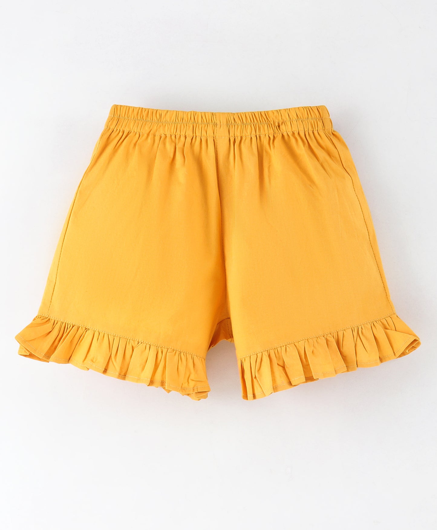 Mustard solid shorts with frills at the bottom