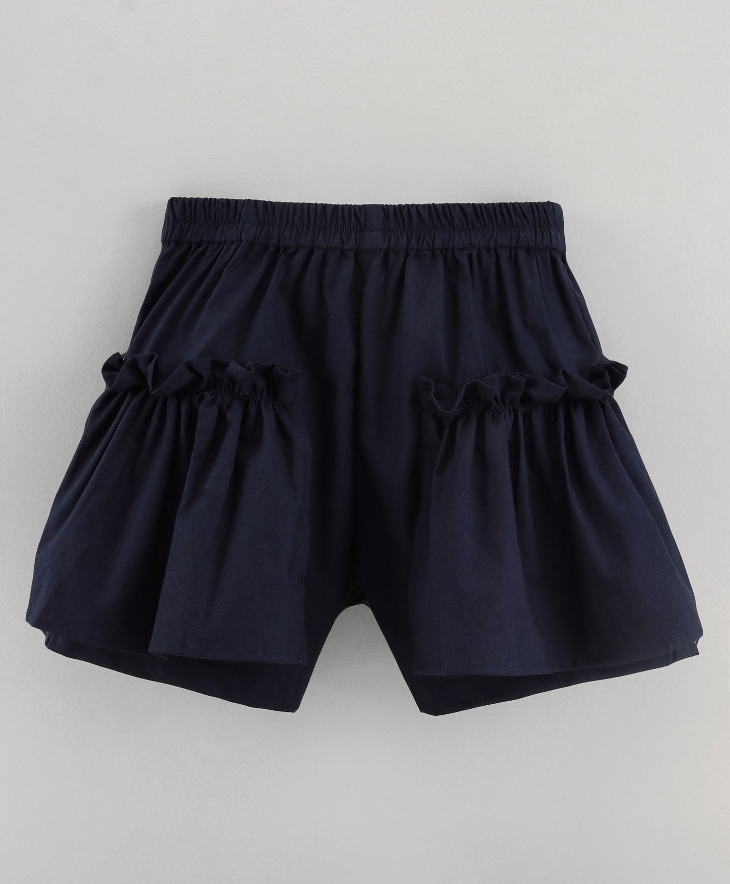 Navy shorts with side ruffle detailing