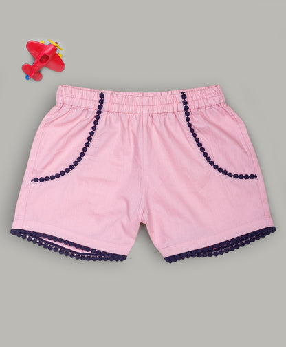 Pink shorts with navy lace detailing