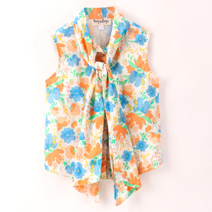 soft pastel floral print top with tie up at neck