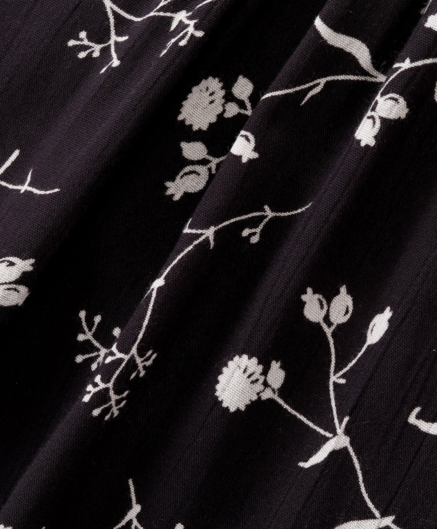 Sleeveless All Over Flower Stem Printed & Lace Embellished Top - Black