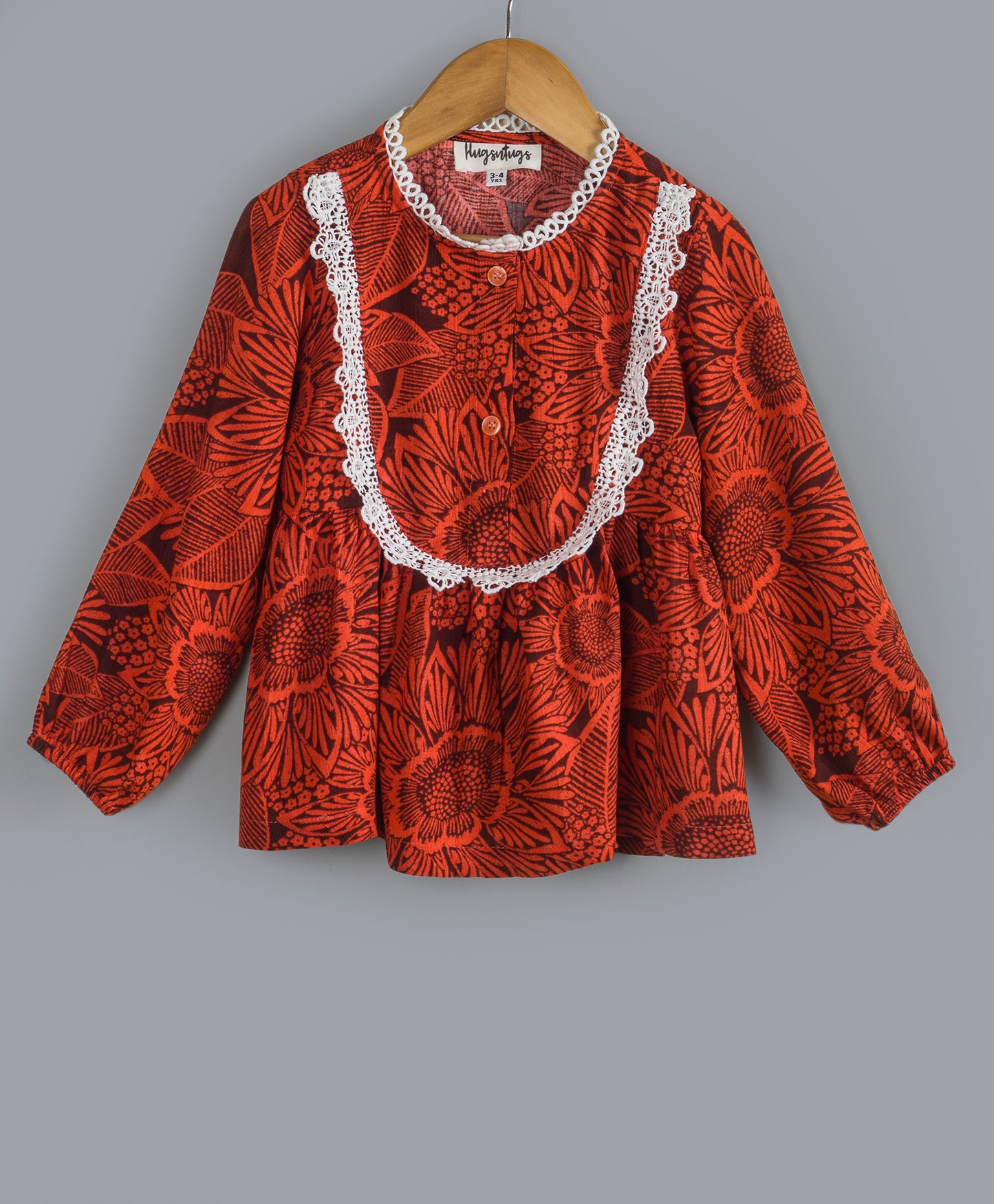 BRICK RED SELF PRINT TOP WITH CONTRAST LACE ALONG YOKE