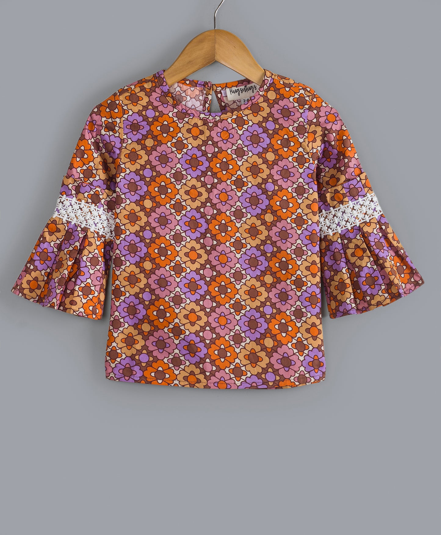 GEOMETRIC FLORAL PRINT TOP WITH BELL SLEEVES AND CONTRAST LACE ON SLEEVES