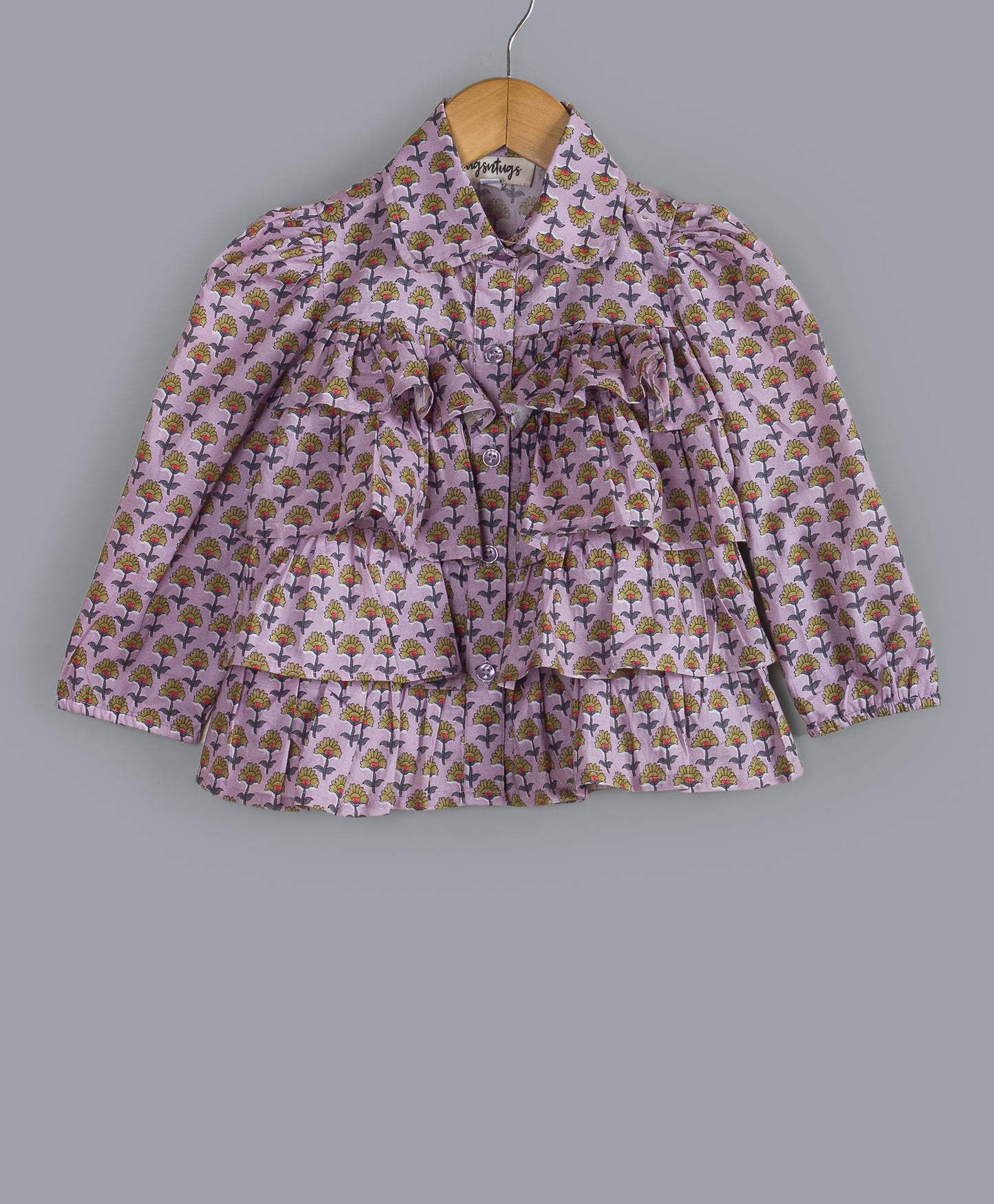 LIGHT PURPLE ALL OVER MOTIF PRINT TOP WITH FRILLS AT FRONT