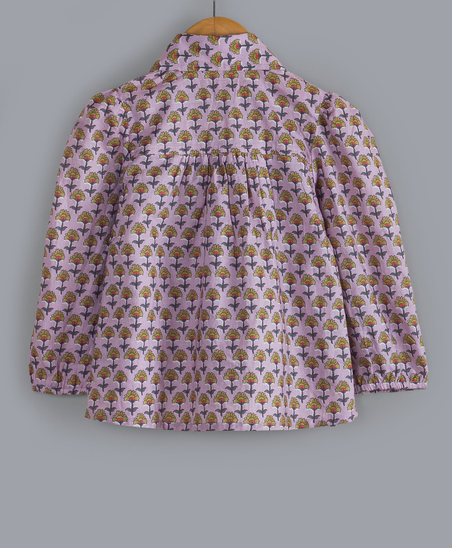 LIGHT PURPLE ALL OVER MOTIF PRINT TOP WITH FRILLS AT FRONT