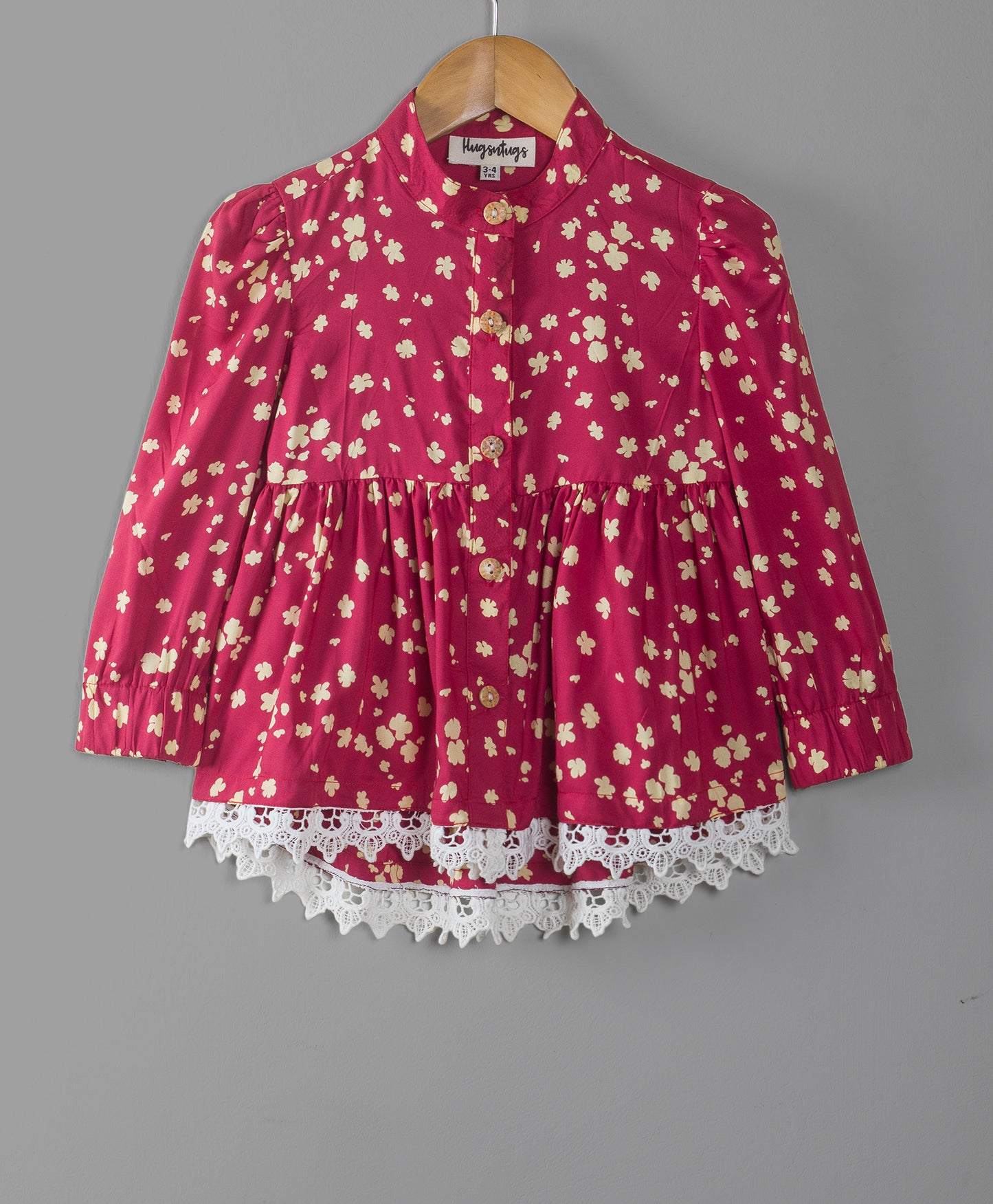ALL OVER SMALL FLOWER PRINT MAROON TOP WITH LACE AT THE BOTTOM EDGE