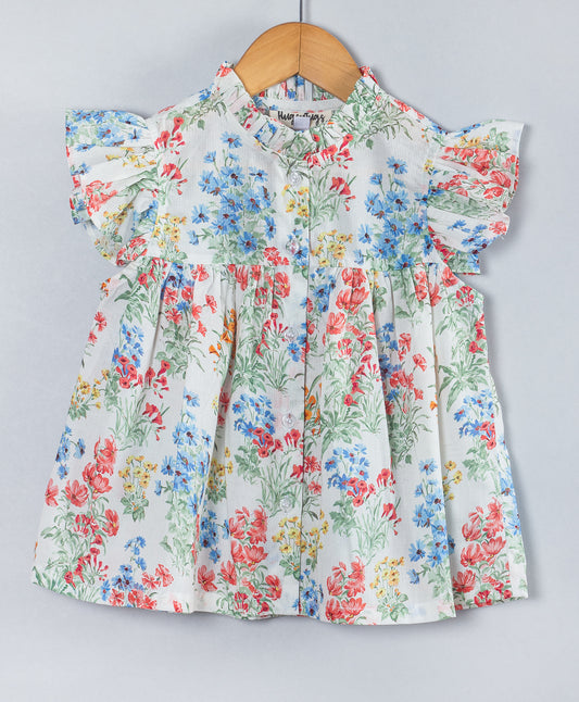 MULTI FLORAL PRINT TOP WITH FRILLS AT NECK AND ARMHOLE