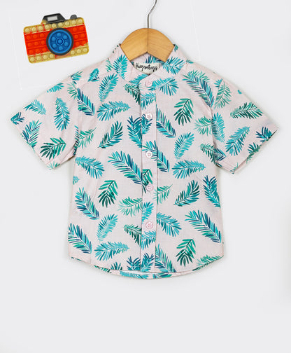 Pink shirt with palm leaves print