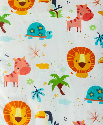 multi jungle print cot set with aqua multi dot side print