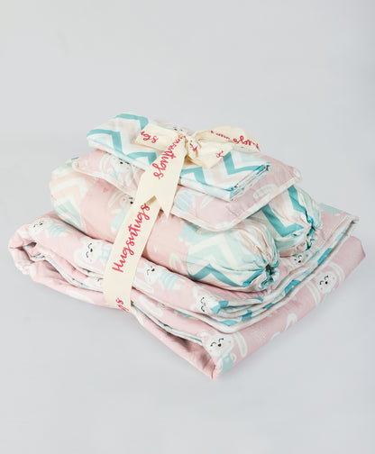 pink bunny print cot set with blue chevron side prnt