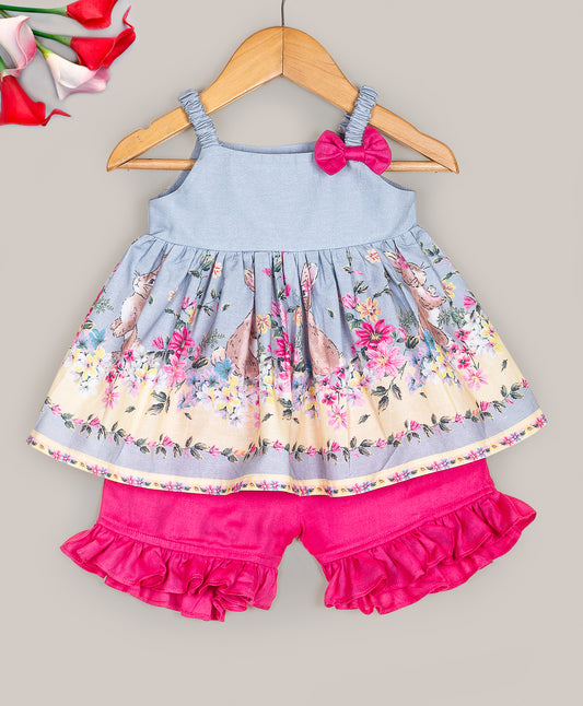 BLUE BORDER FLOWER PRINT TOP WITH BOW AT STRAP AND SOLID PINK SHORTS