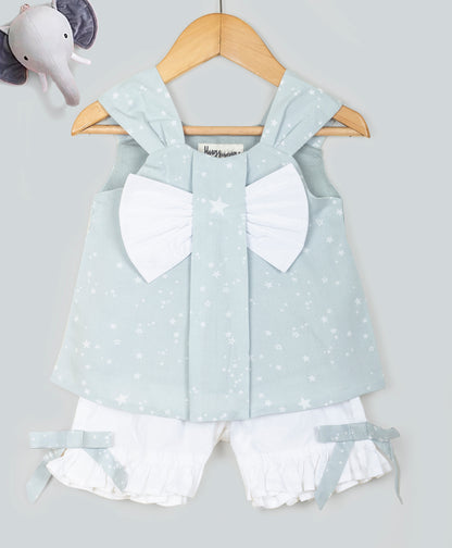 STAR PRINT TOP WITH BOW AT CENTRE FRONT AND SOLID SHORTS