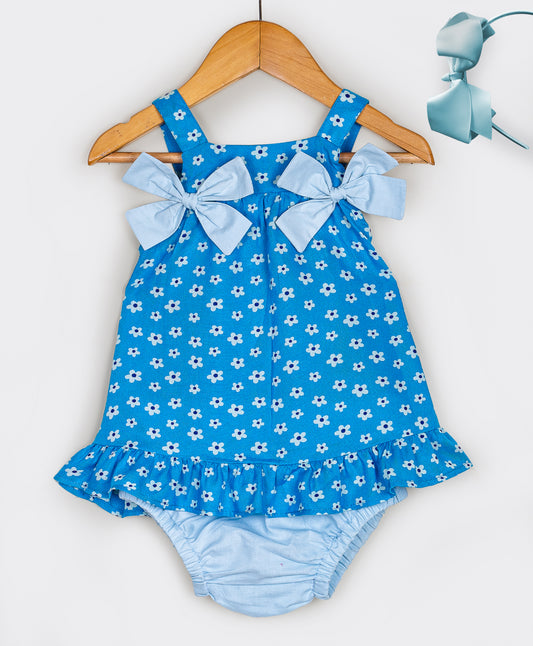 Blue floral print infant coordinate with bow on the straps
