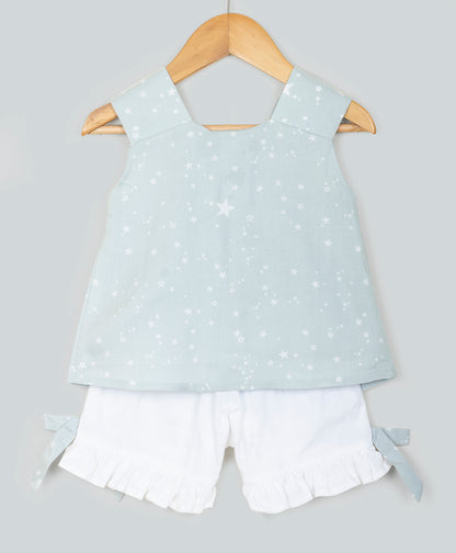 STAR PRINT TOP WITH BOW AT CENTRE FRONT AND SOLID SHORTS