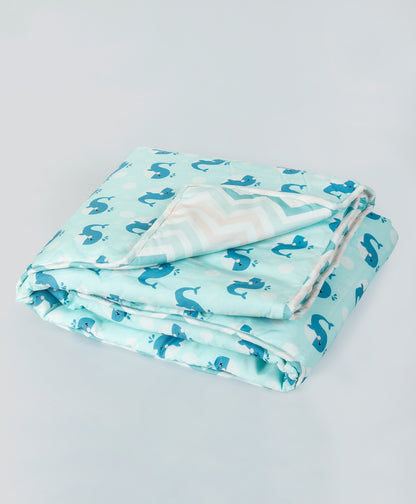 blue dolphin  print AC quilt with blue chevron lining print