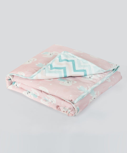 pink bunny print AC quilt with blue chevron lining prnt